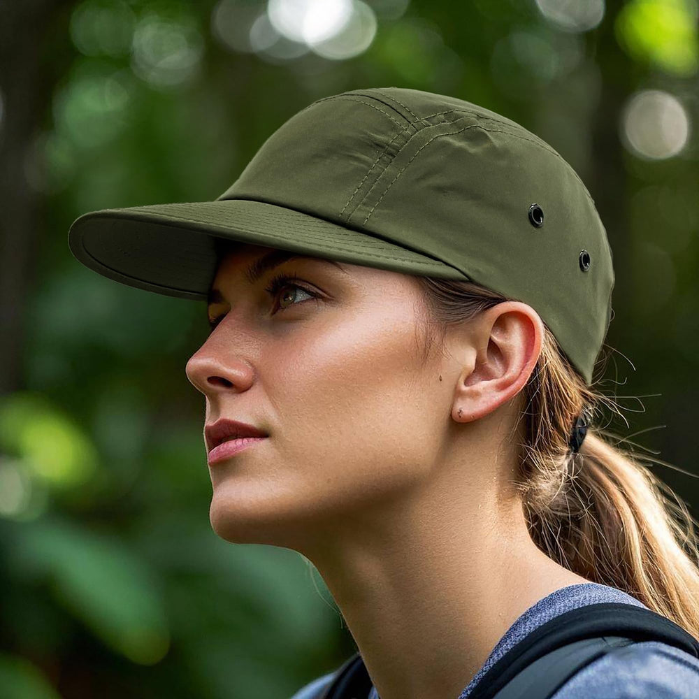 Unstructured 5-panel cap with wide flat brim on model