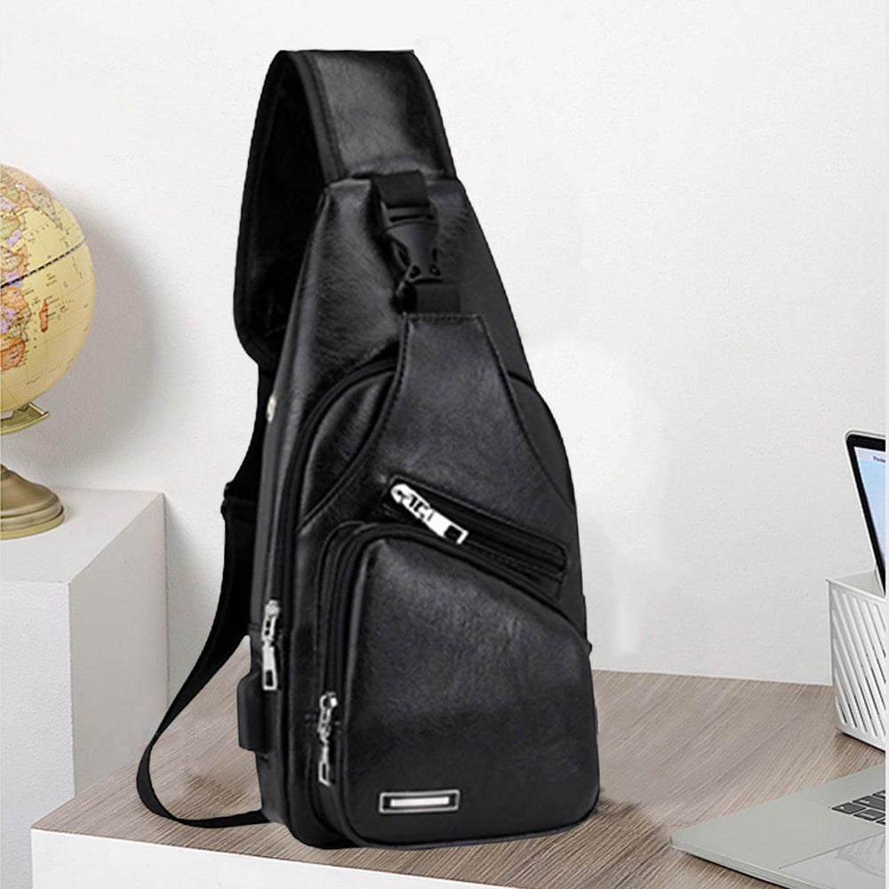 Crossbody Sling Bag main compartment fits up to 8-inch tablets.