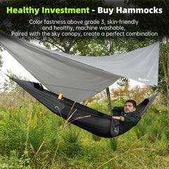 Crosship camping hammock rain fly demonstrates weather-ready shelter for light rain.