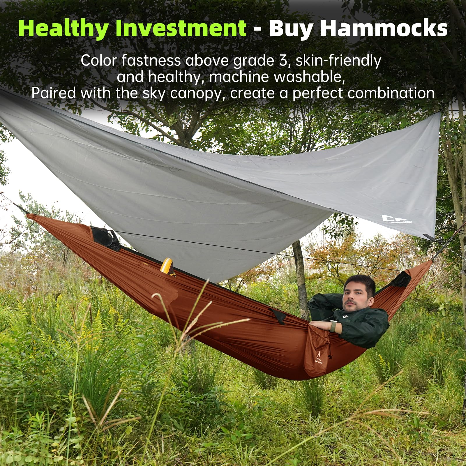 CROSSHIP aluminum stakes and wind rope stabilize the hammock setup.