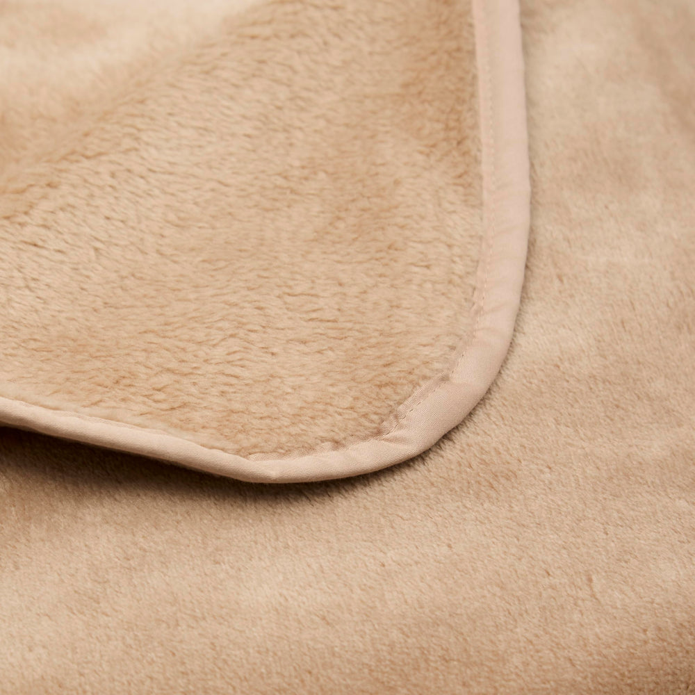 Cuddledown plush texture close-up highlights velvety softness and lightweight comfort