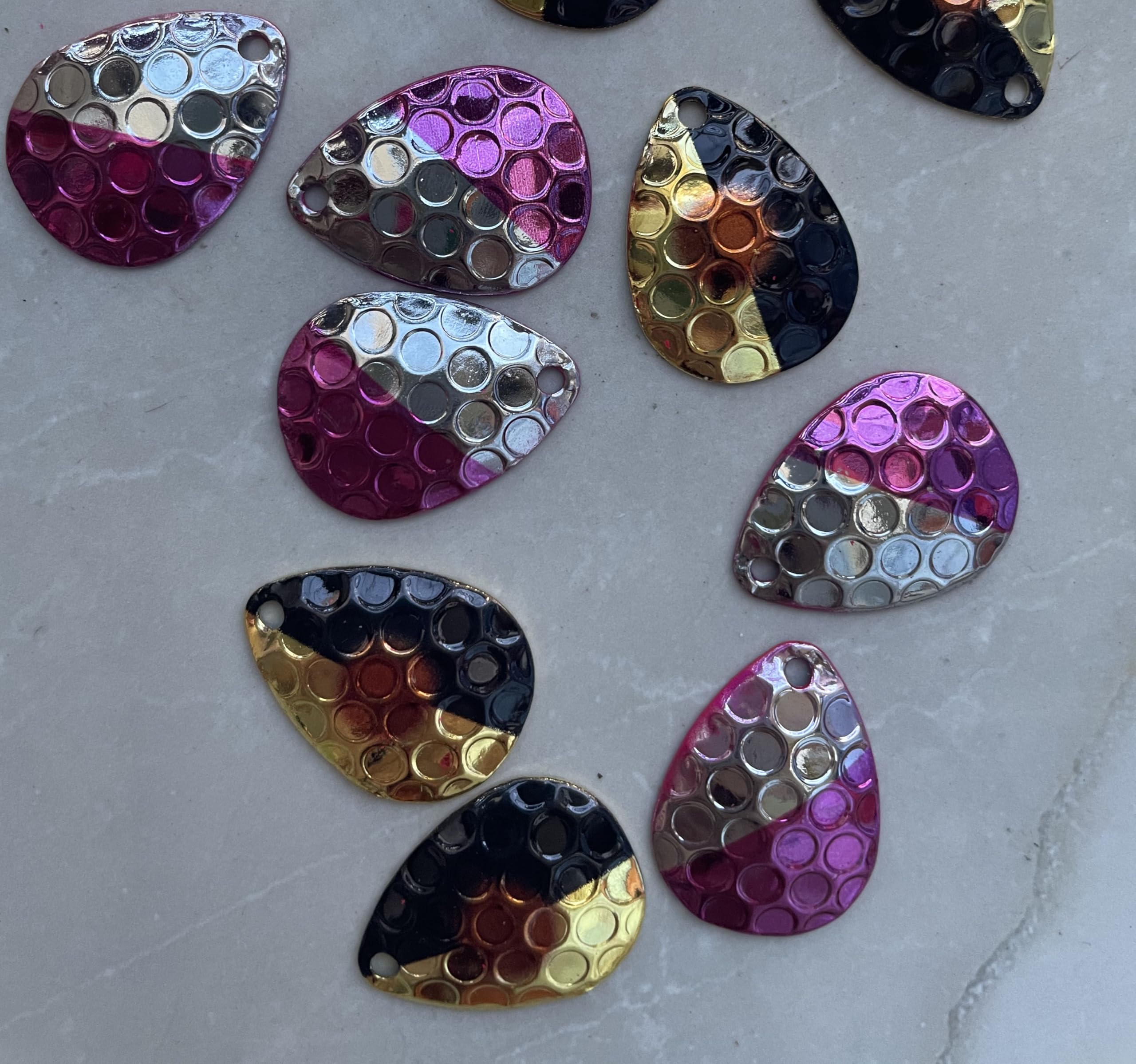 Colorful hammered Colorado blades for walleye and bass lures