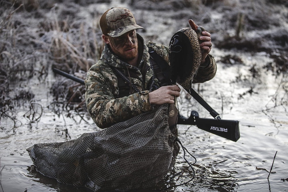 Cupped Waterfowl durable mesh storage stands up to wet, muddy field use