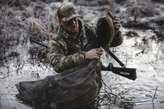 Cupped Waterfowl durable mesh storage stands up to wet, muddy field use