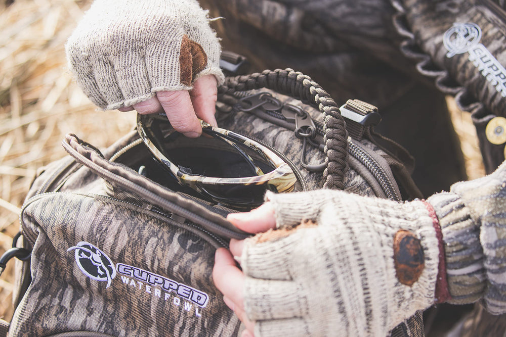 Cupped Waterfowl duck tote strap with carabiner eases bird transport.