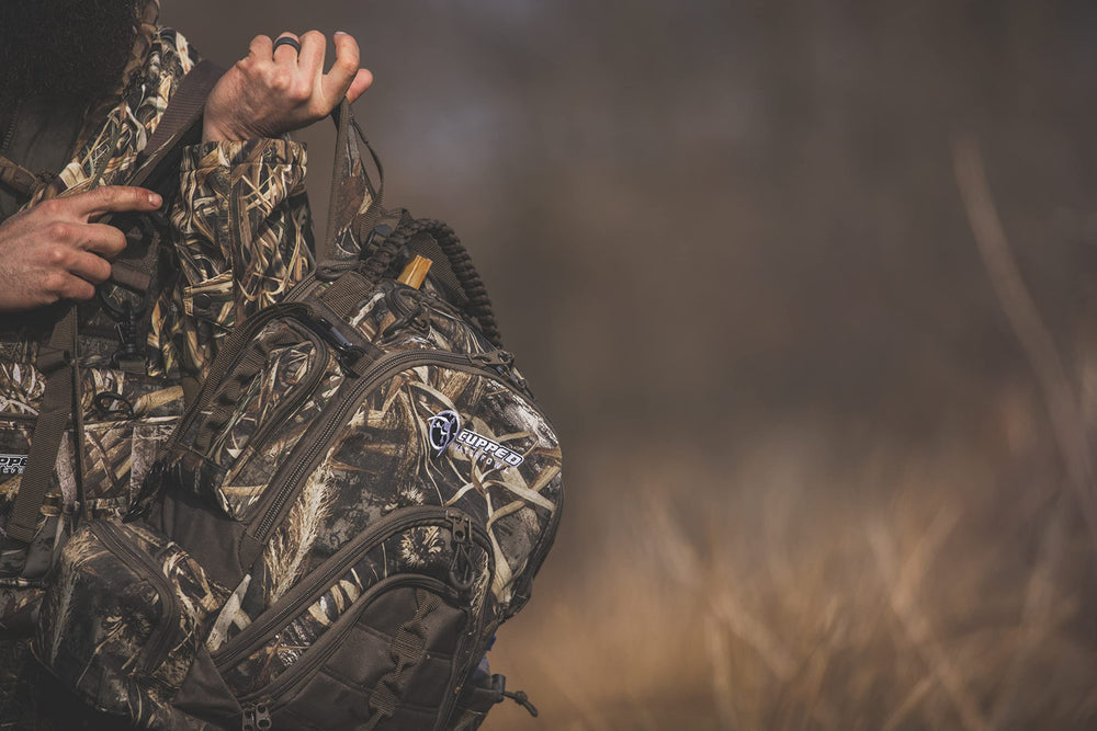 Cupped Waterfowl Duck-tote-strap enables hands-free carry of game.