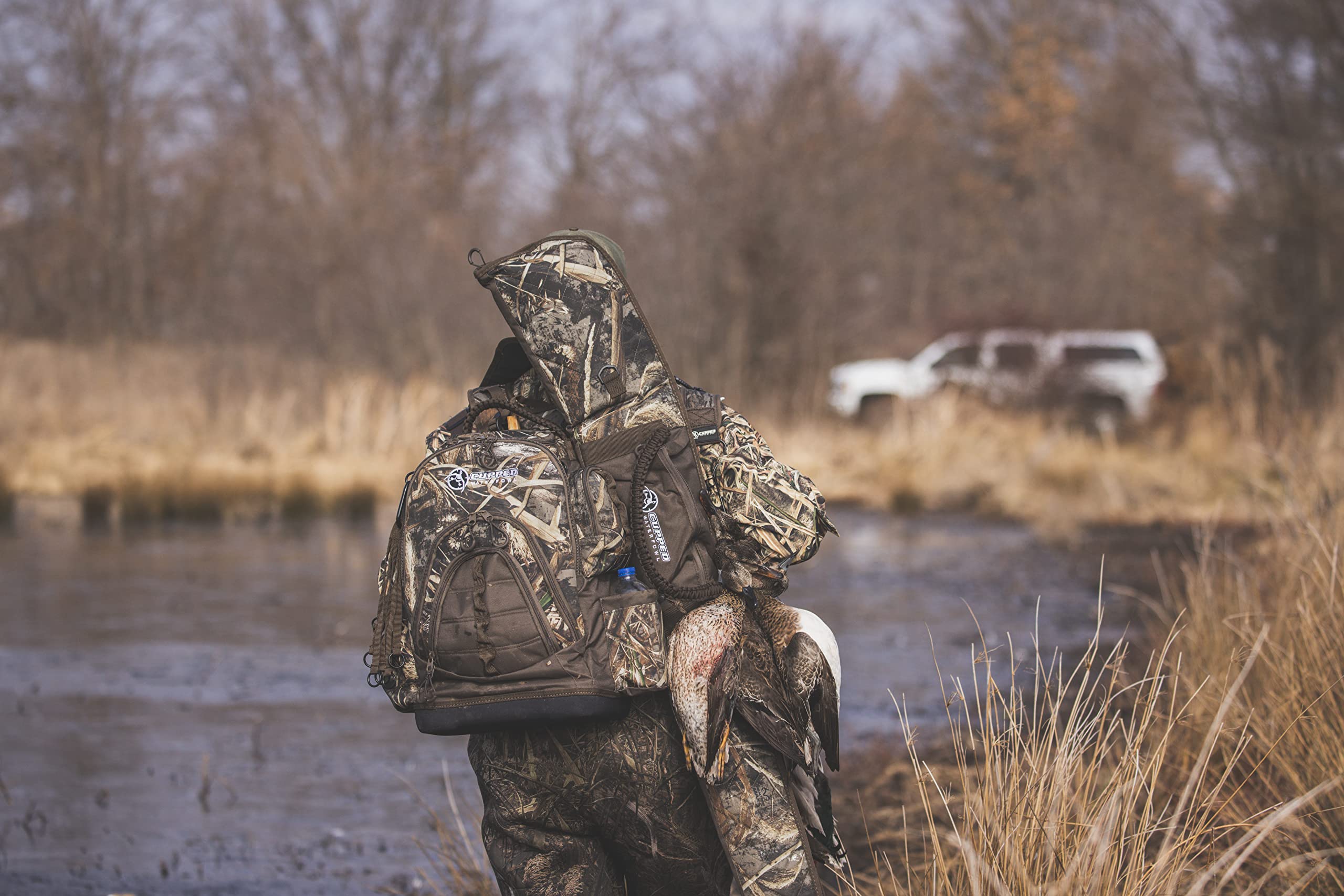 Cupped Waterfowl Padded-laptop-pocket guards electronics during transport through rugged fields.