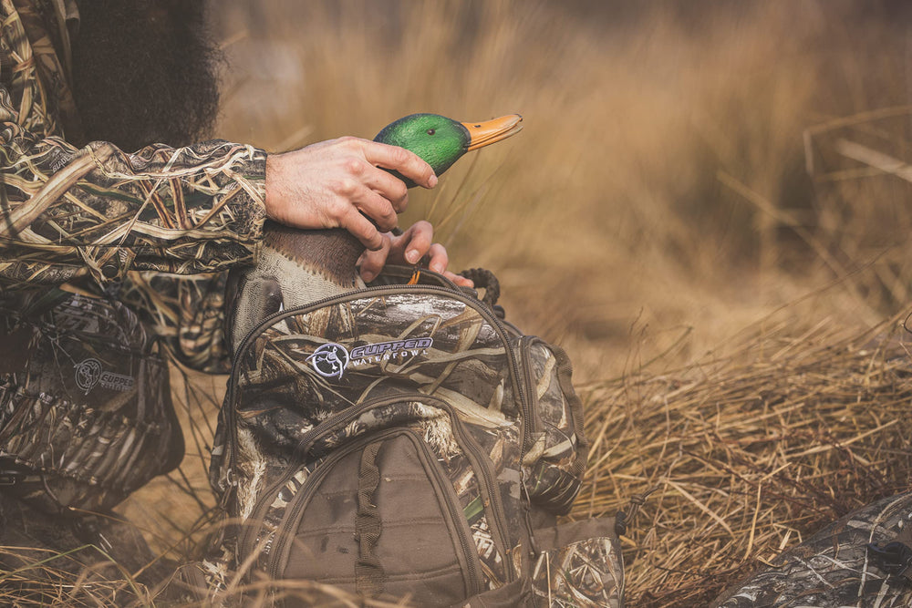 Cupped Waterfowl Realtree MAX-7 camo blends with surroundings for discreet hunts.