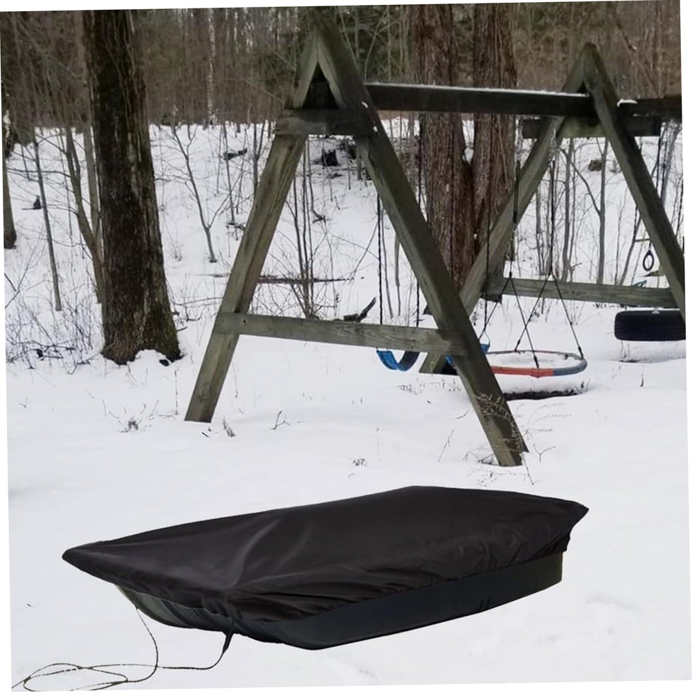 Sled cover ready for storage and travel with weather-resistant features.