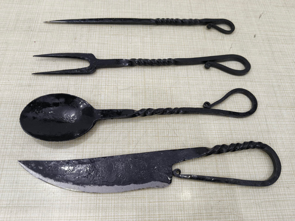 Cutlery Set Knife cuts through meals with sturdy blade in rustic design.