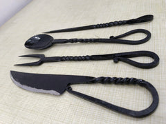 Cutlery Set Twisted Design iron utensils showcase rugged medieval craftsmanship.