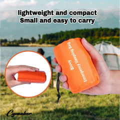 Cymuber Emergency Sleeping Bag waterproof Mylar material protects you from rain.