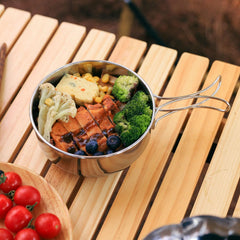 Cyrank compact camping pot with collapsible design, saves space in packs.
