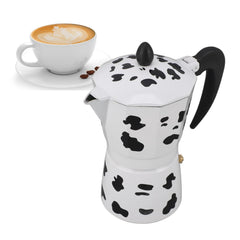 Cyrank Moka Pot with cow-pattern design brews outdoors for rich, café-style espresso.