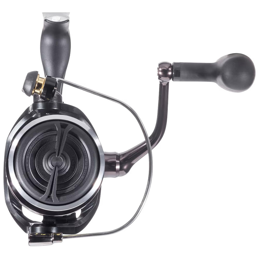 Daiwa BG MQ 14000 reel in hand illustrates comfortable grip and strong retrieval.