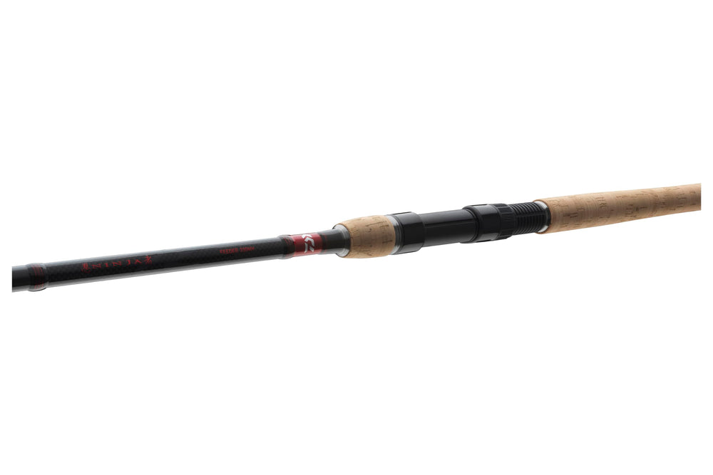 Daiwa Ninja X Feeder 390XH titanium oxide guides closeup.