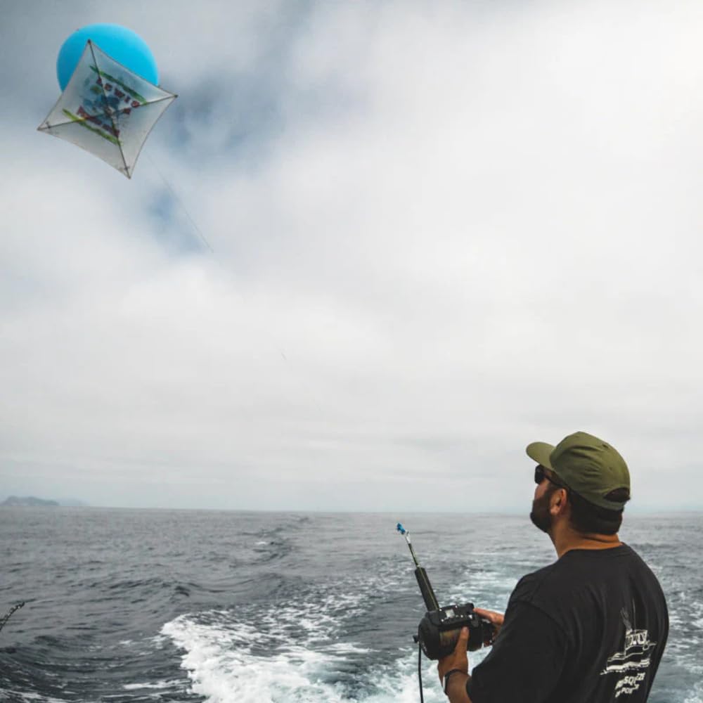 Daiwa Tanacom 1200 reel in use on a boat for effortless deep-drop retrieval.