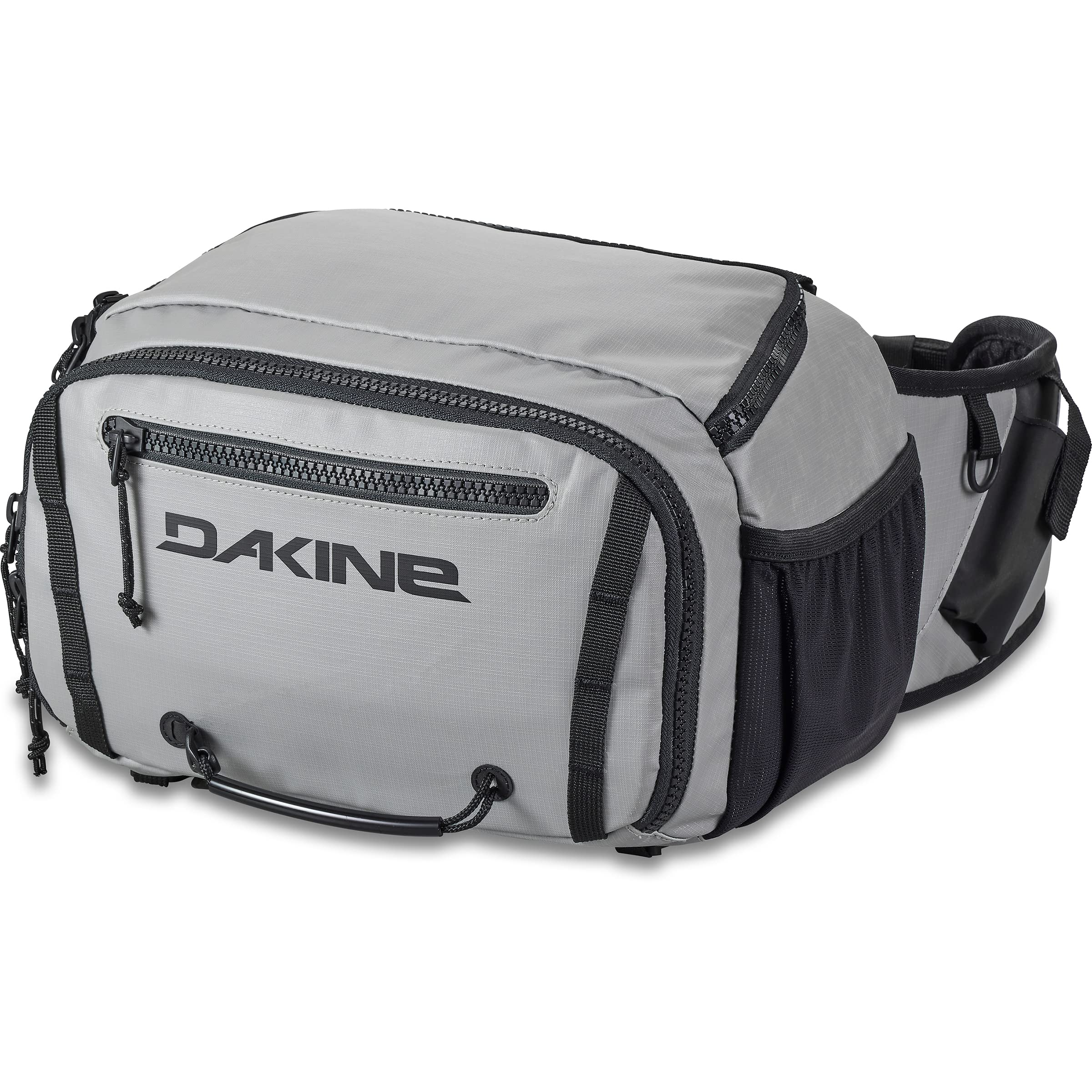 Dakine Mission Fish 12L waist pack worn for quick gear access on the shore