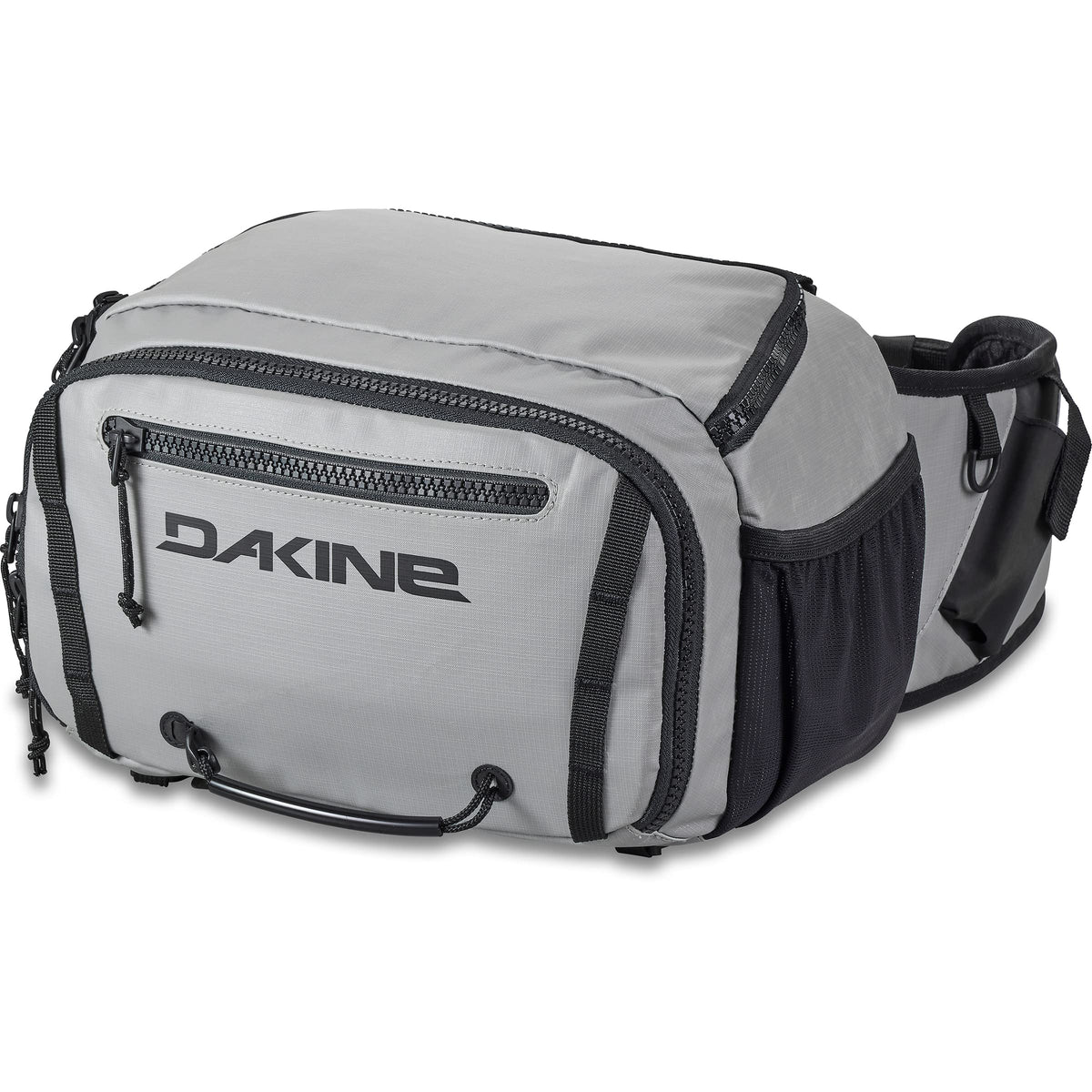 Dakine Mission Fish 12L waist pack worn for quick gear access on the shore