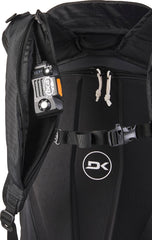 Dakine Poacher 40L backpack, top pocket access for quick essentials on tours.