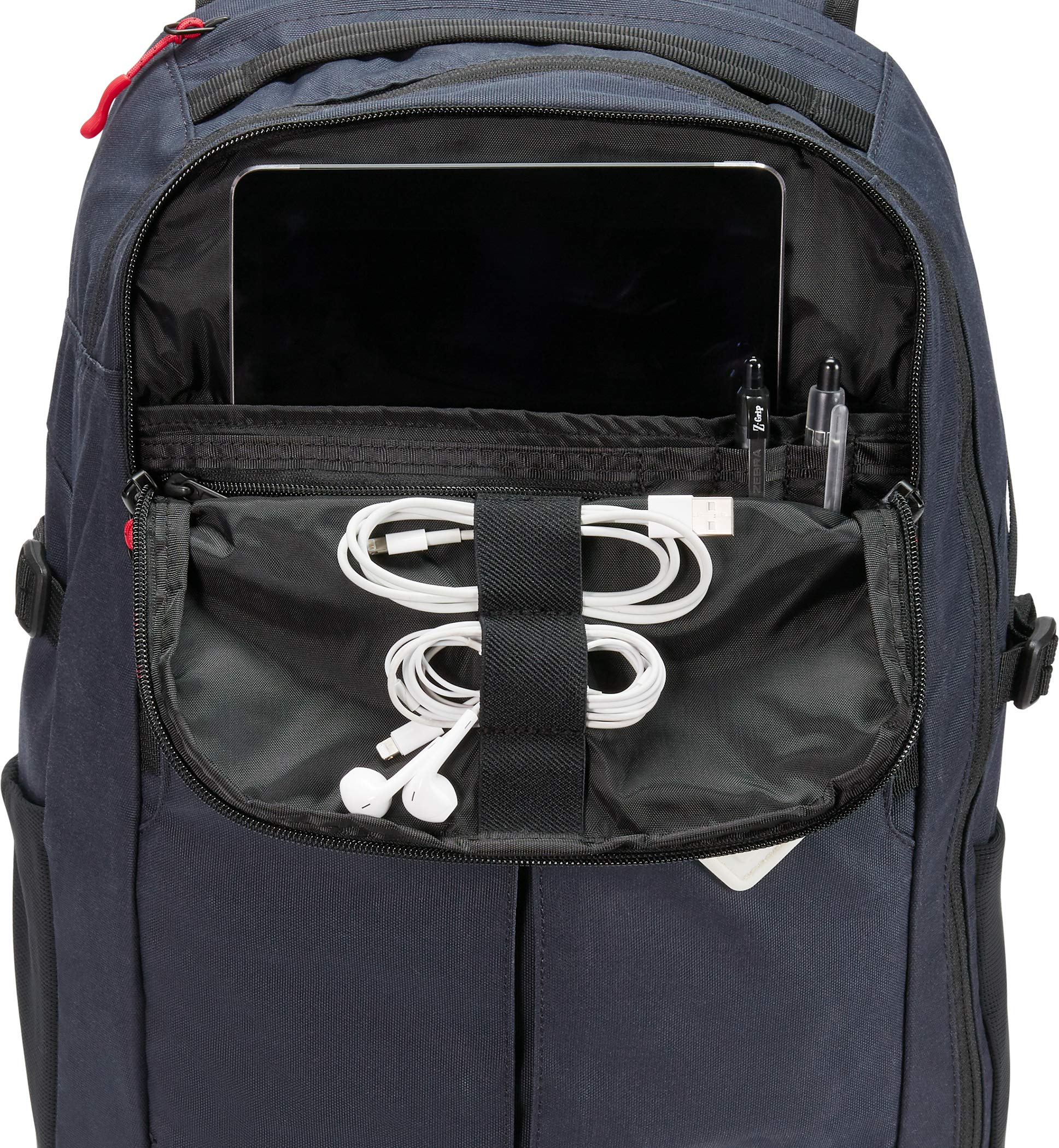 Dakine Split Adventure 38L bottom shoe pocket keeps footwear separate during travel.