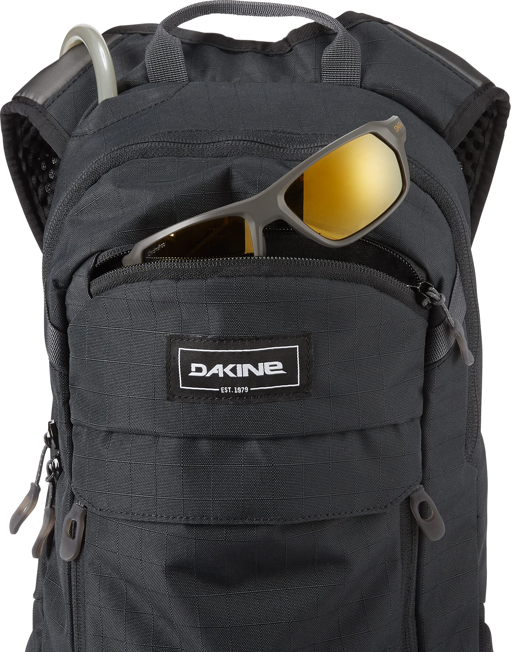Dakine Syncline 12L tools snacks layers pocket keeps essentials organized.