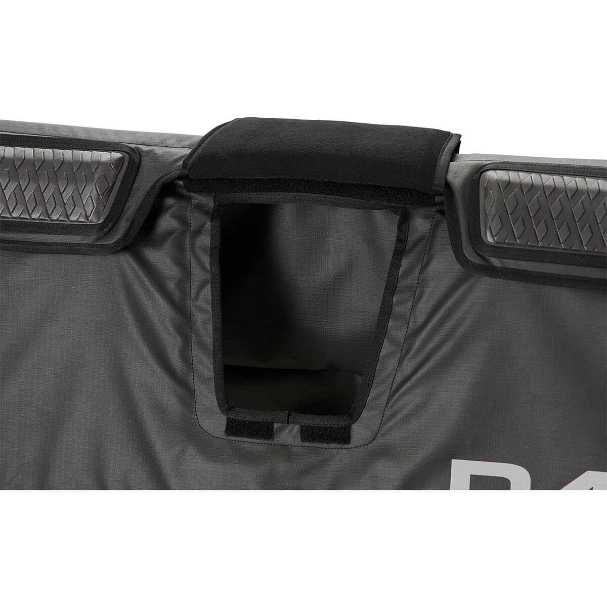 Four cinch straps with cam locks secure the pad to the tailgate