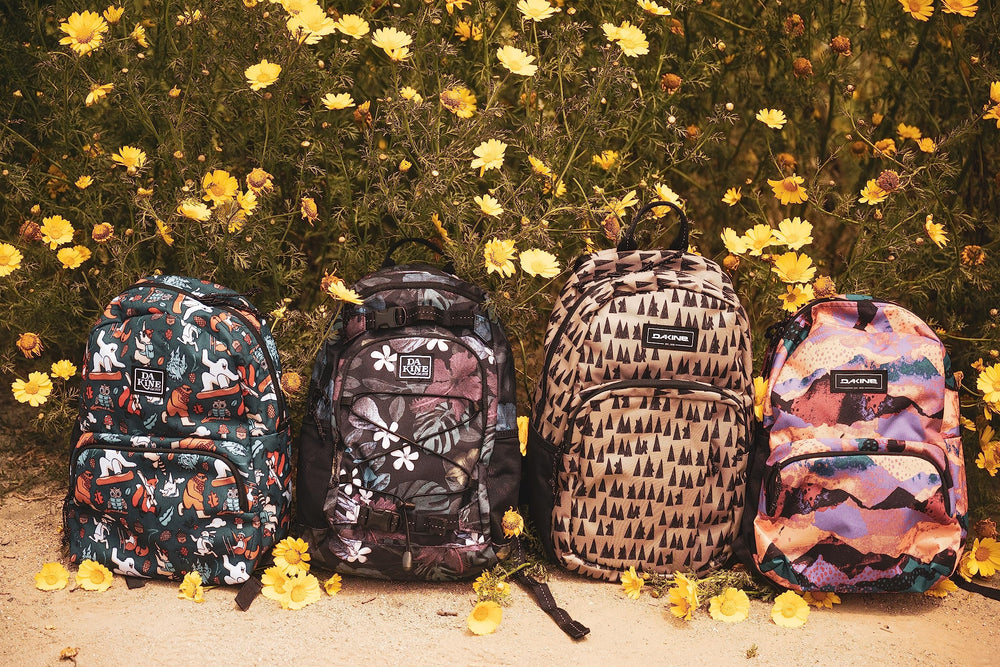 Dakine Youth Grom Pack Forest Friends cargo bungee storage for tidy gear on hikes