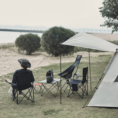 Damei century portable camping chair shown in a park setup for picnics and shade.