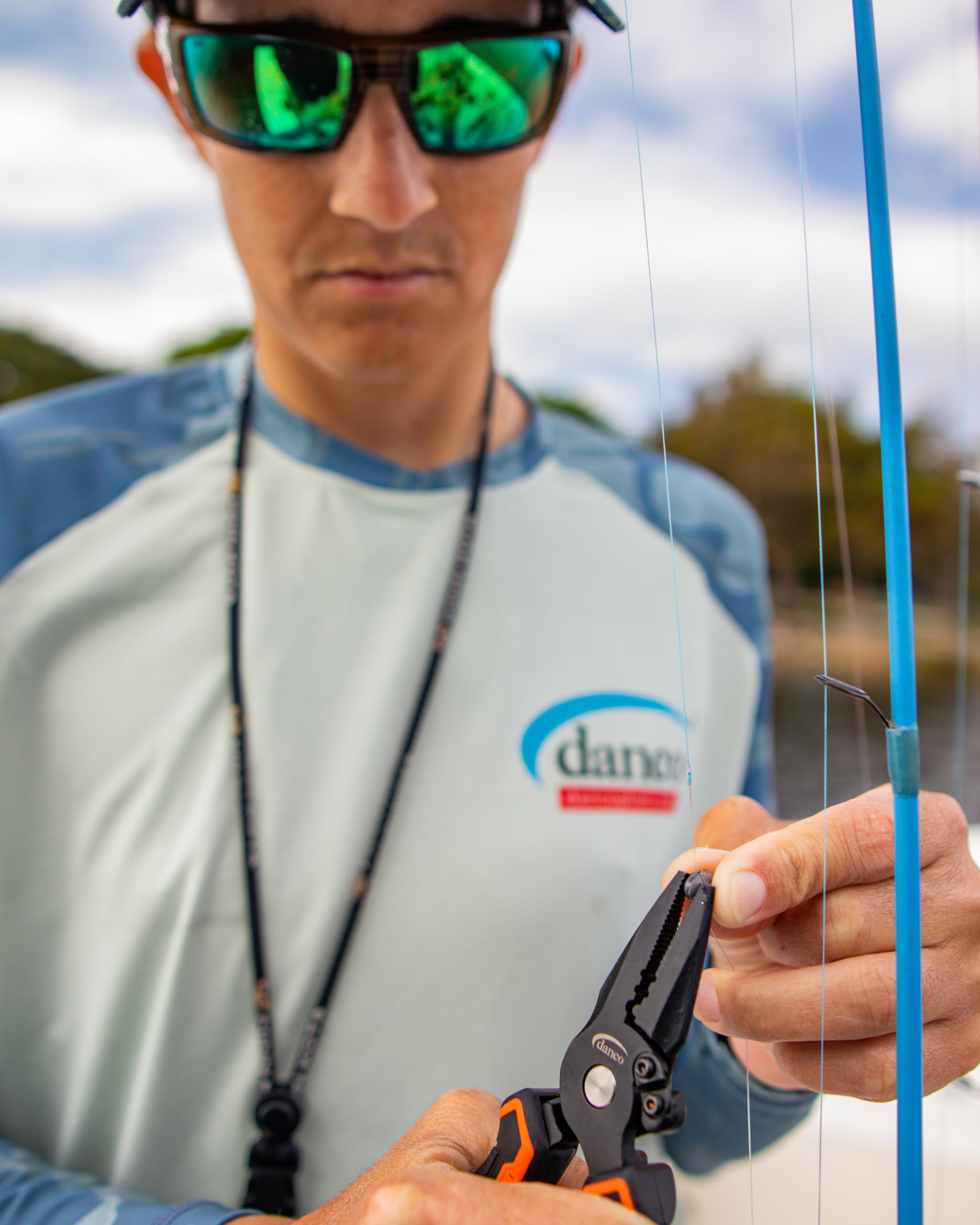 Danco Lunar sheath with belt clip for quick one-handed access on deck.