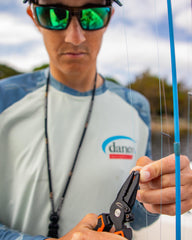 Danco Lunar sheath with belt clip for quick one-handed access on deck.
