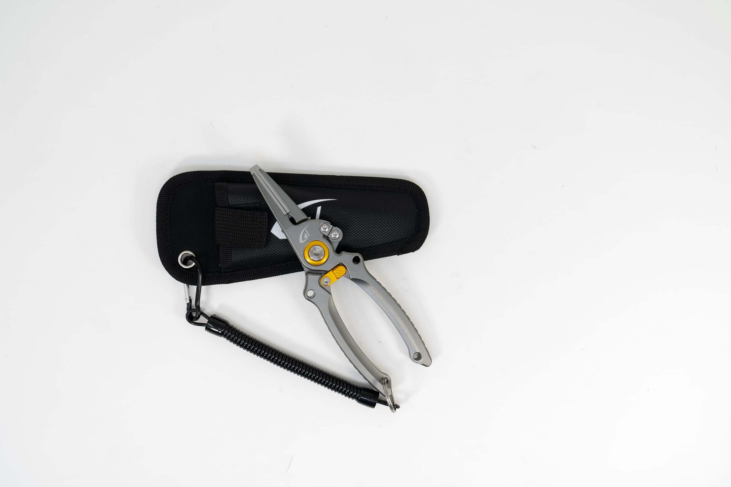Danco pliers clipped to belt with sheath on water