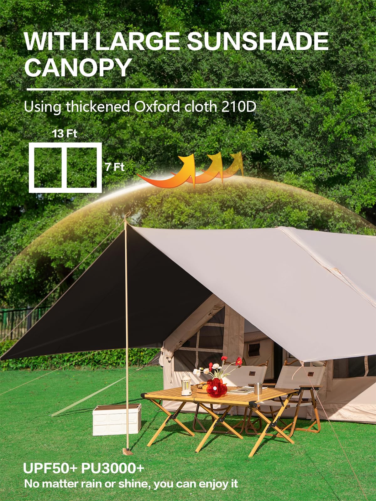 DanCoom inflatable camping tent side awning extended for shade and gear storage.
