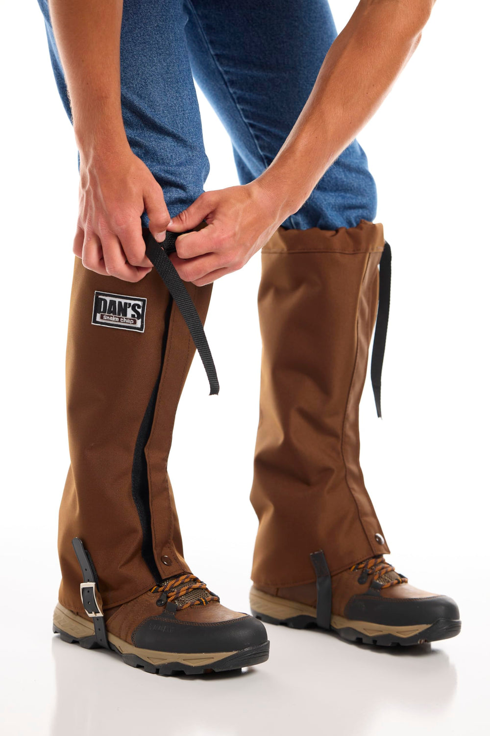Dans Hunting Gear adjustable top buckle and boot strap for versatile leg coverage.