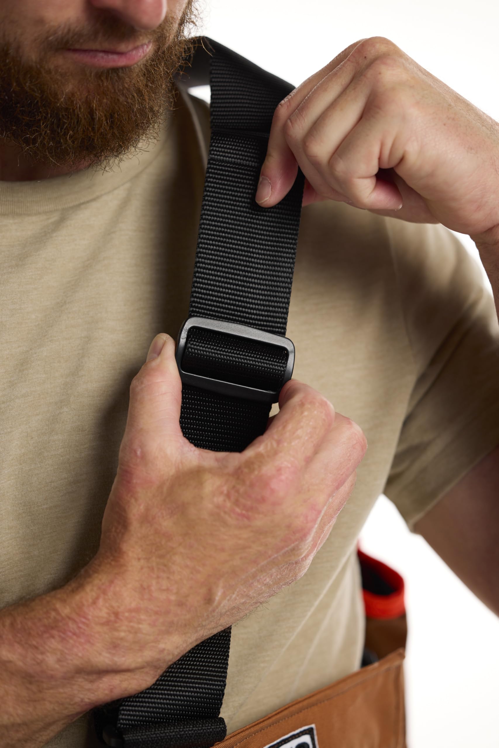 DAN'S Hunting Gear Upland Strap Vest integrated blood-proof game bag simplifies post-hunt cleanup.
