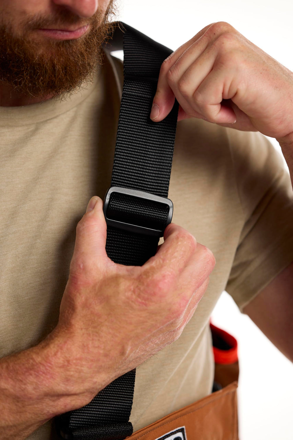 DAN'S Hunting Gear Upland Strap Vest integrated blood-proof game bag simplifies post-hunt cleanup.