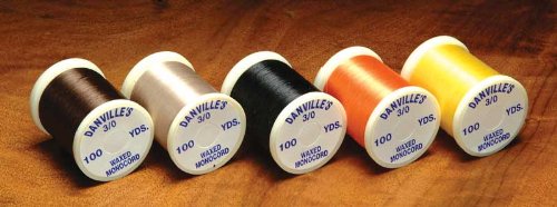Danville 3/0 Mono Waxed Red spool showing strong, low-stretch tying for robust patterns