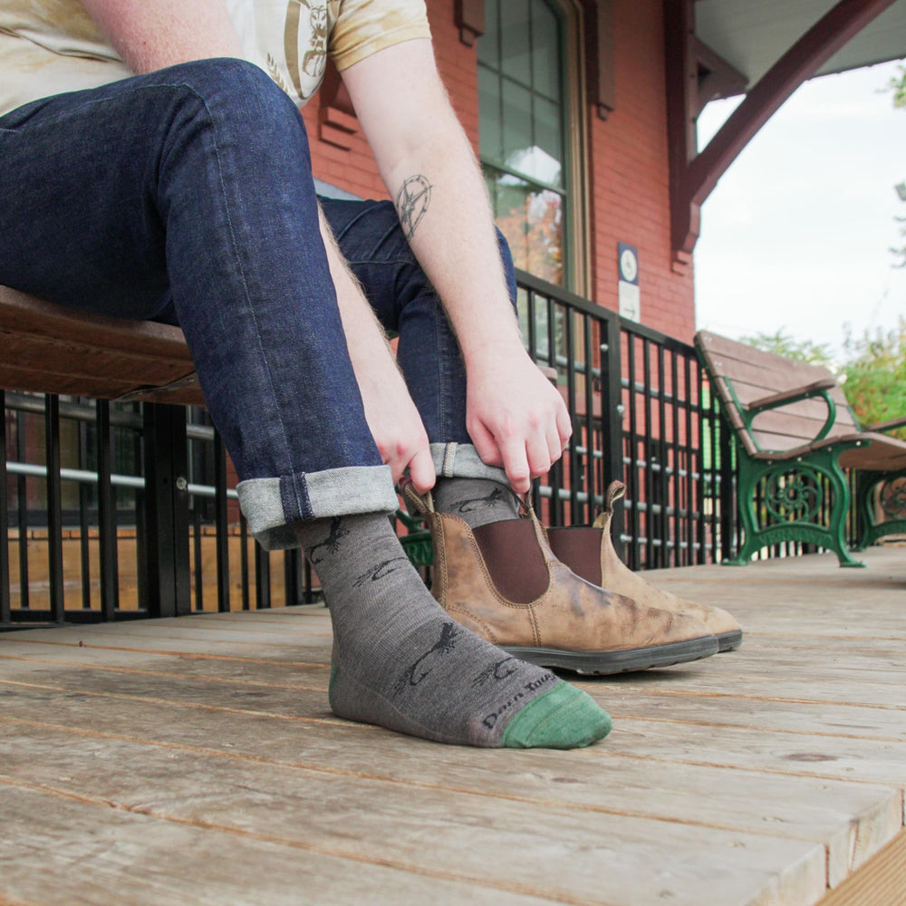 Darn Tough Vermont Everyday crew-height socks highlight secure fit and breathability.