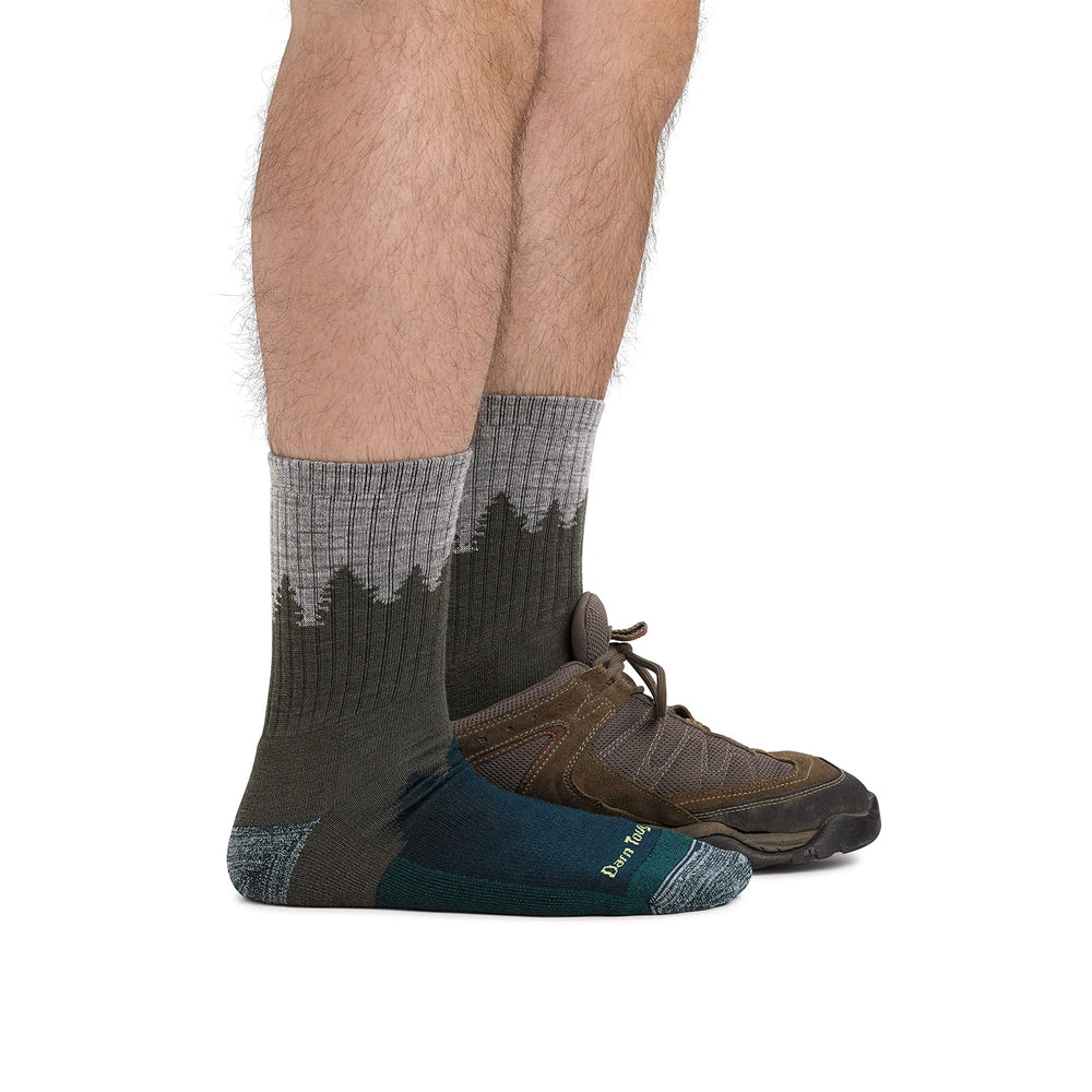 Darn Tough teal socks Merino blend for breathable warmth on trails.