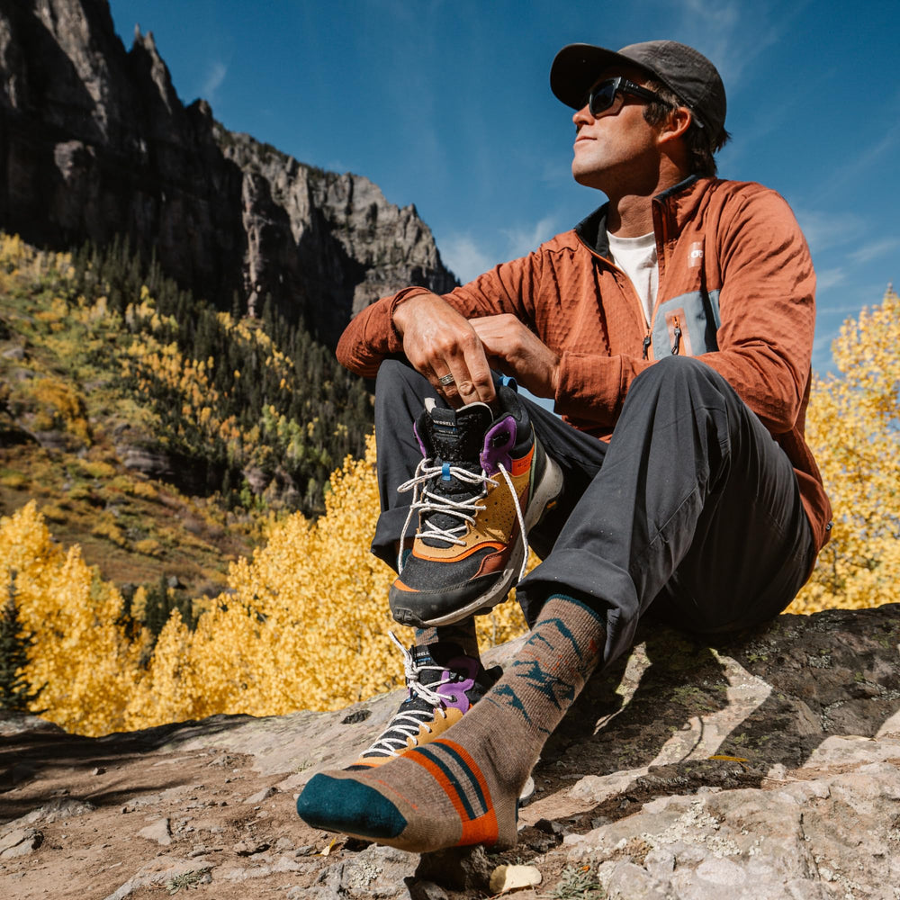 Darn Tough Vermont Hike Hut Micro Crew socks, cushion detail, plush underfoot support for rugged trails.