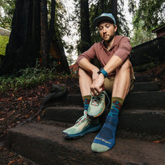 Darn Tough Vermont men's micro crew socks lightweight cushioning reduces foot fatigue on hikes.