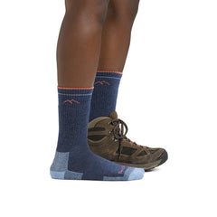 Darn Tough Vermont sock on feet demonstrates breathable, fast-drying performance for all-day comfort.