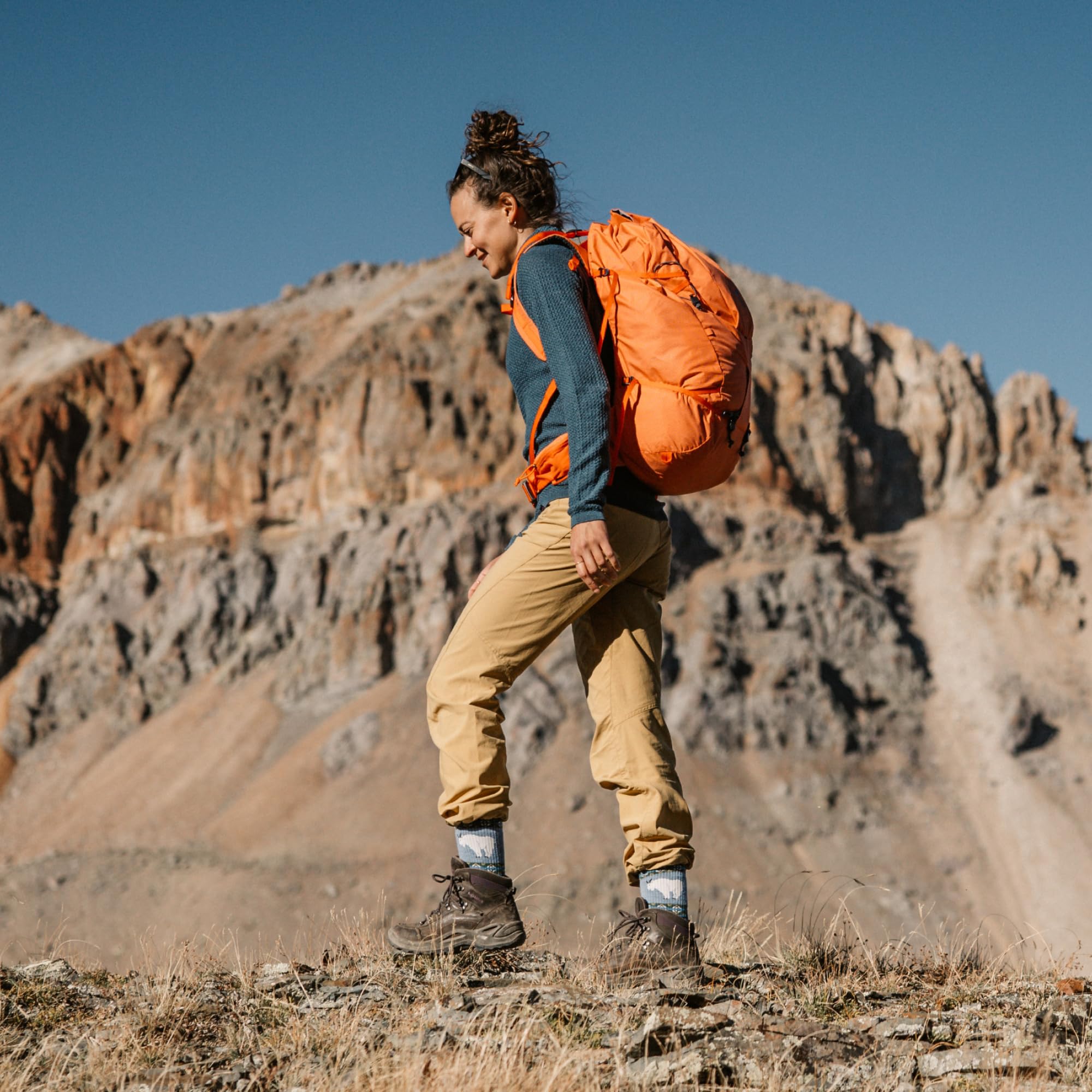 Darn Tough women's hiking socks Merino blue crew on foot delivers all-day comfort and moisture control.