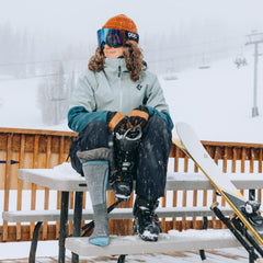 Darn Tough Swirlwind 8057 gray cuff detail shows cushioned warmth for Nordic activities.