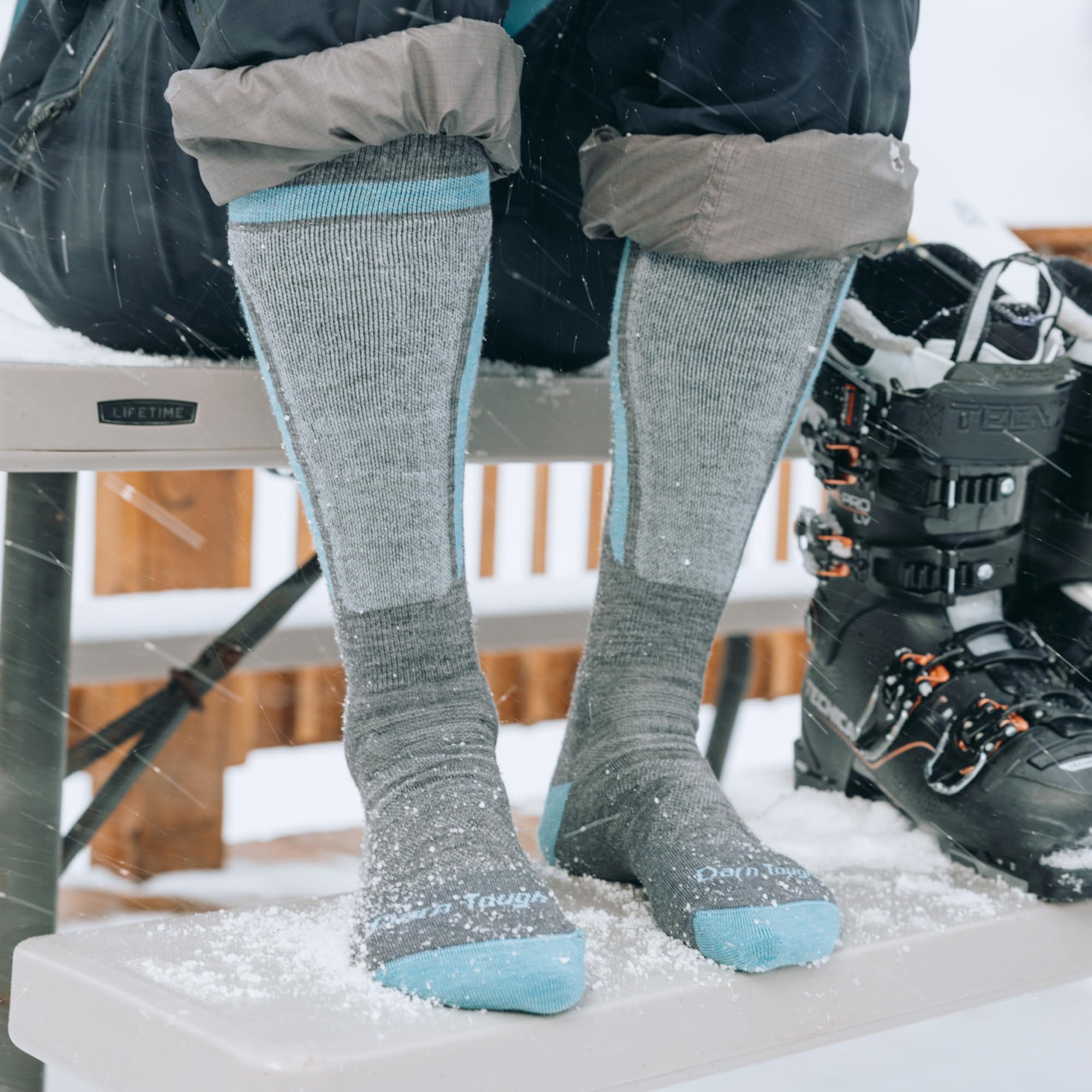 Darn Tough Swirlwind snow sock over-the-calf fit in gray for cold weather.