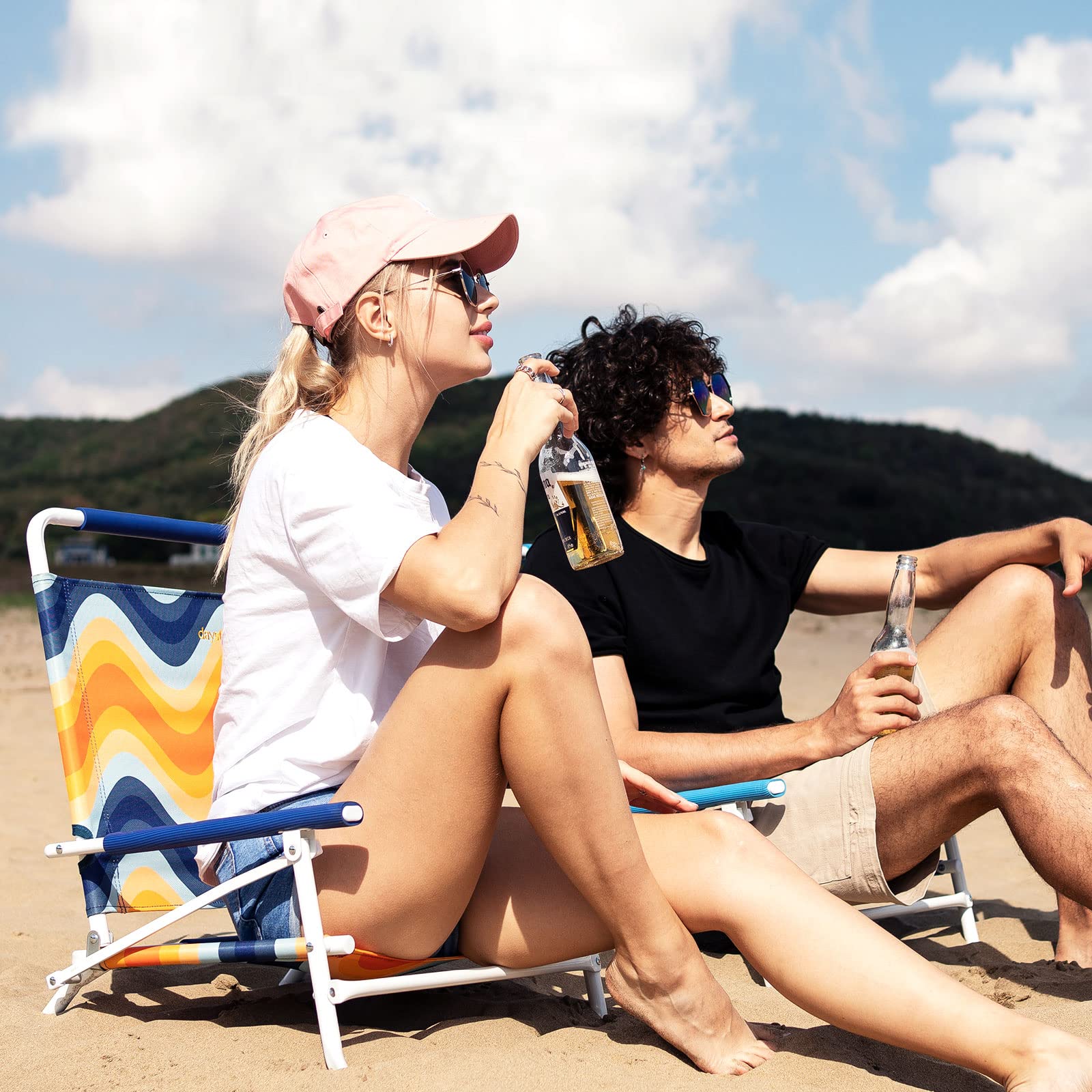 Daystar SunnyFeel low folding beach chair open with high back for comfortable seating.