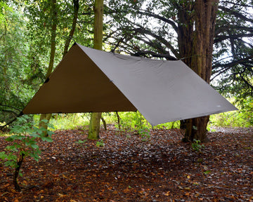 DD Hammocks DD Superlight Tarp stormproof material shields you during heavy downpours.
