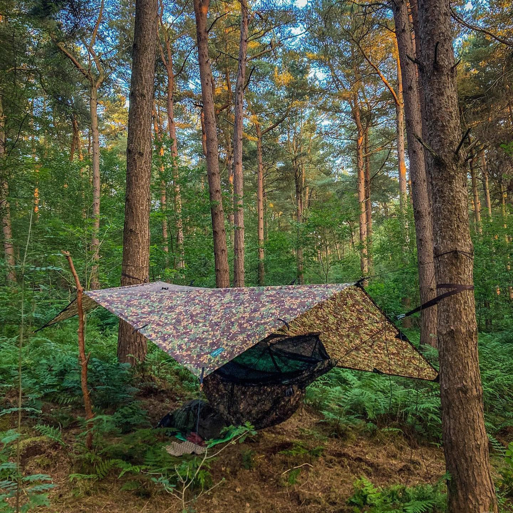 DD Hammocks DD Tarp 3x3 MC Multicam pattern blends with natural environments.