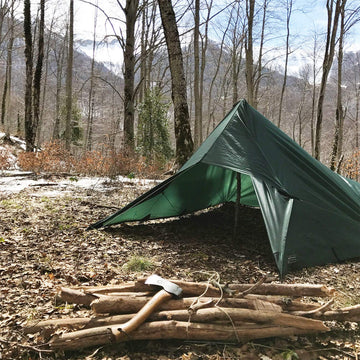 DD Hammocks DD Tarp 3x3 olive green provides shade and rain coverage when pitched between trees