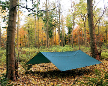 DD Hammocks DD Tarp 4x4 olive UV50+ coating blocks harsh sun during outdoor use.